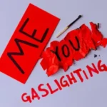 stock-photo-pathological-narcissism-narcissism-gaslighting-red-paper-written-crumpled-torn-red